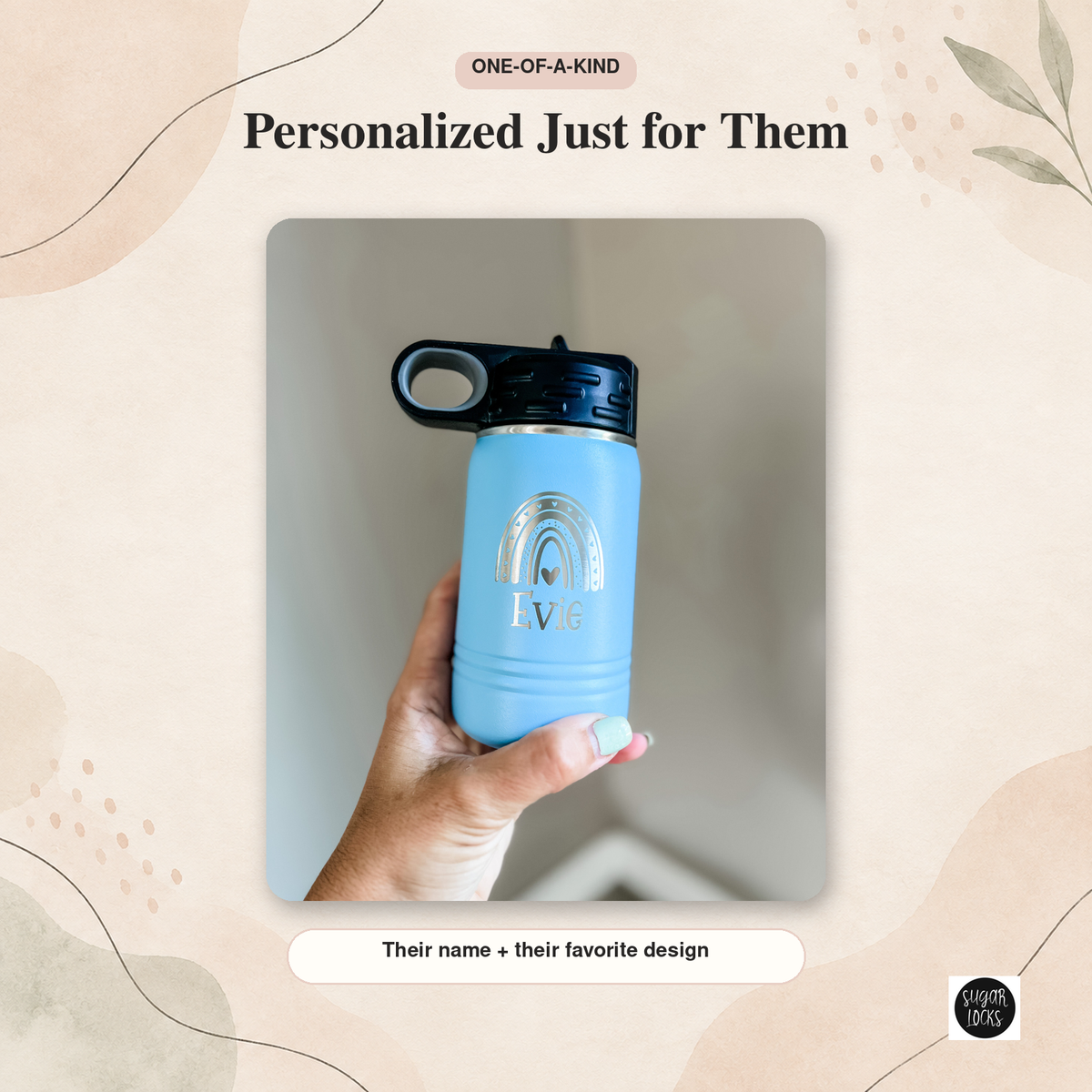 Light blue personalized kids water bottle engraved with the name Evie and a rainbow design