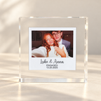 Freestanding clear acrylic photo block with instant-photo-style couple picture and personalized names and date