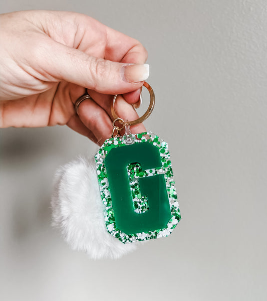 Initial acrylic keychains with Poms
