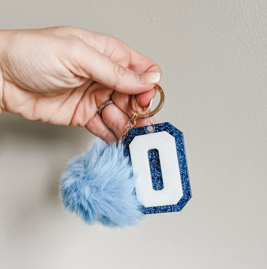Initial acrylic keychains with Poms