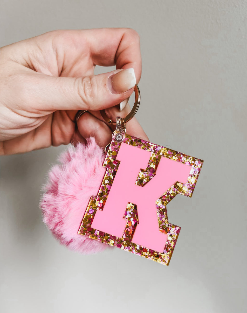 Initial acrylic keychains with Poms