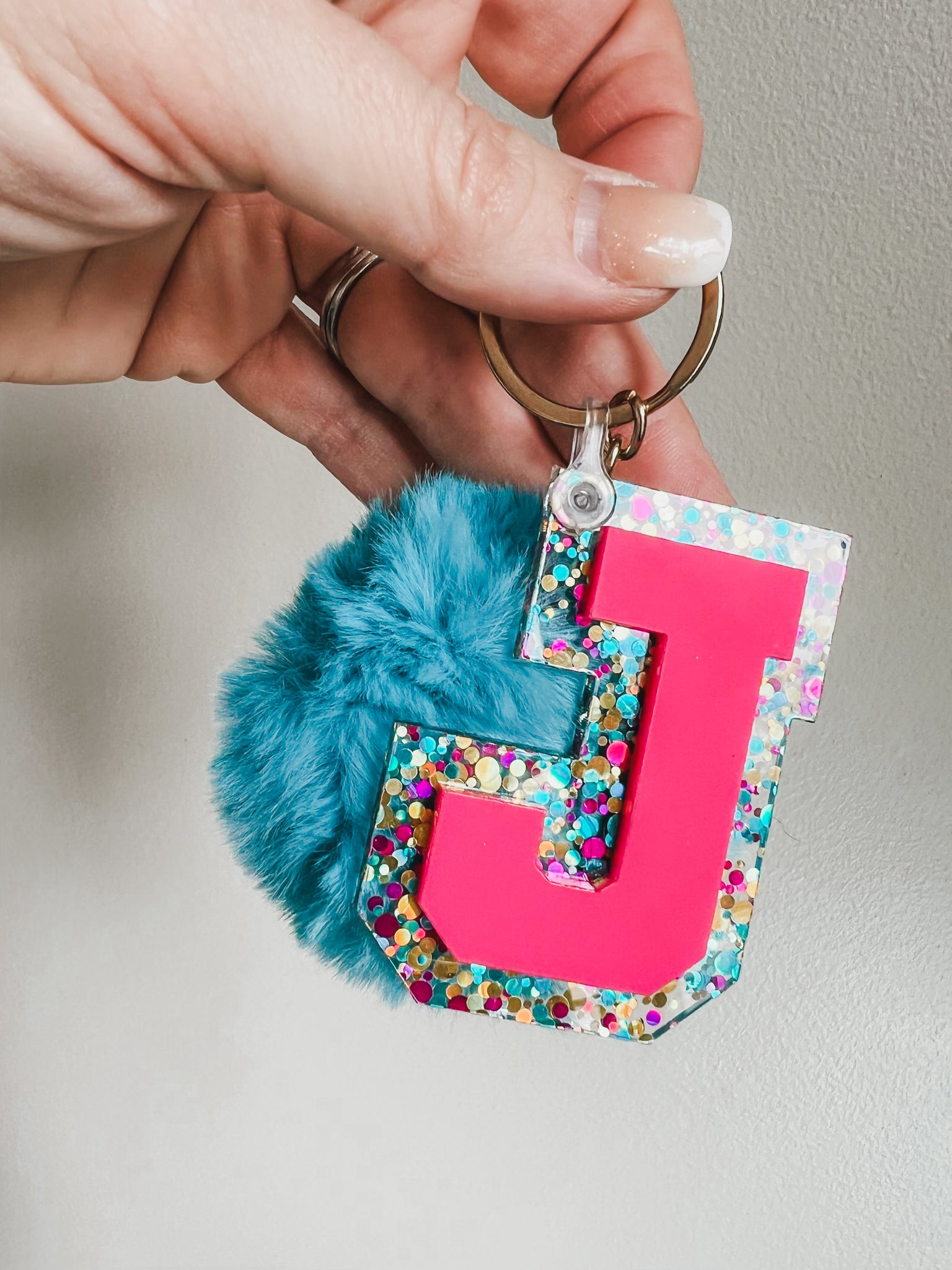 Initial acrylic keychains with Poms