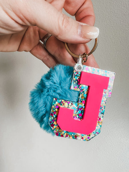 Initial acrylic keychains with Poms