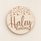 Personalized wooden baby name announcement round with hearts, stars and moons