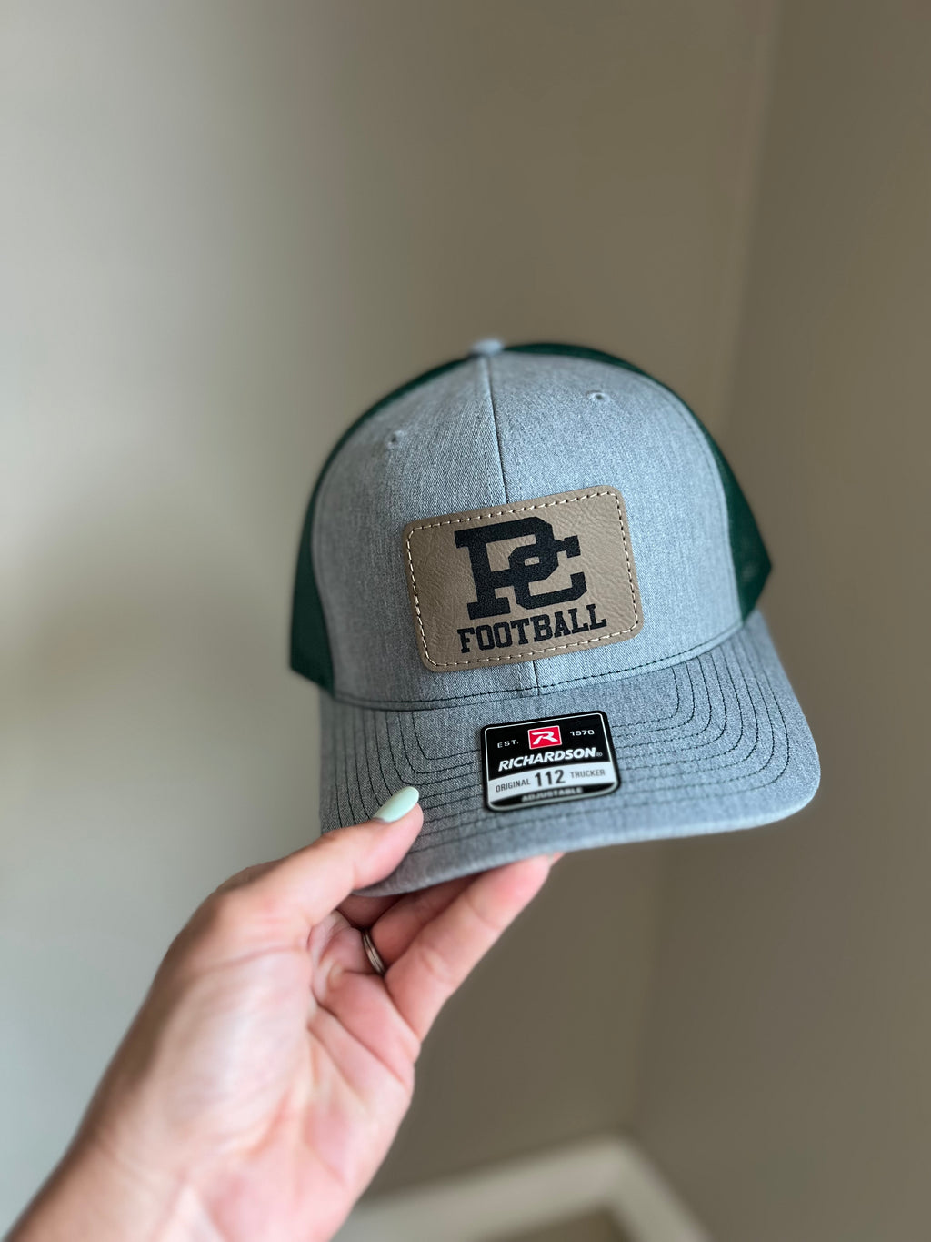 Design your own hat with a custom saying or logo on a leather patch