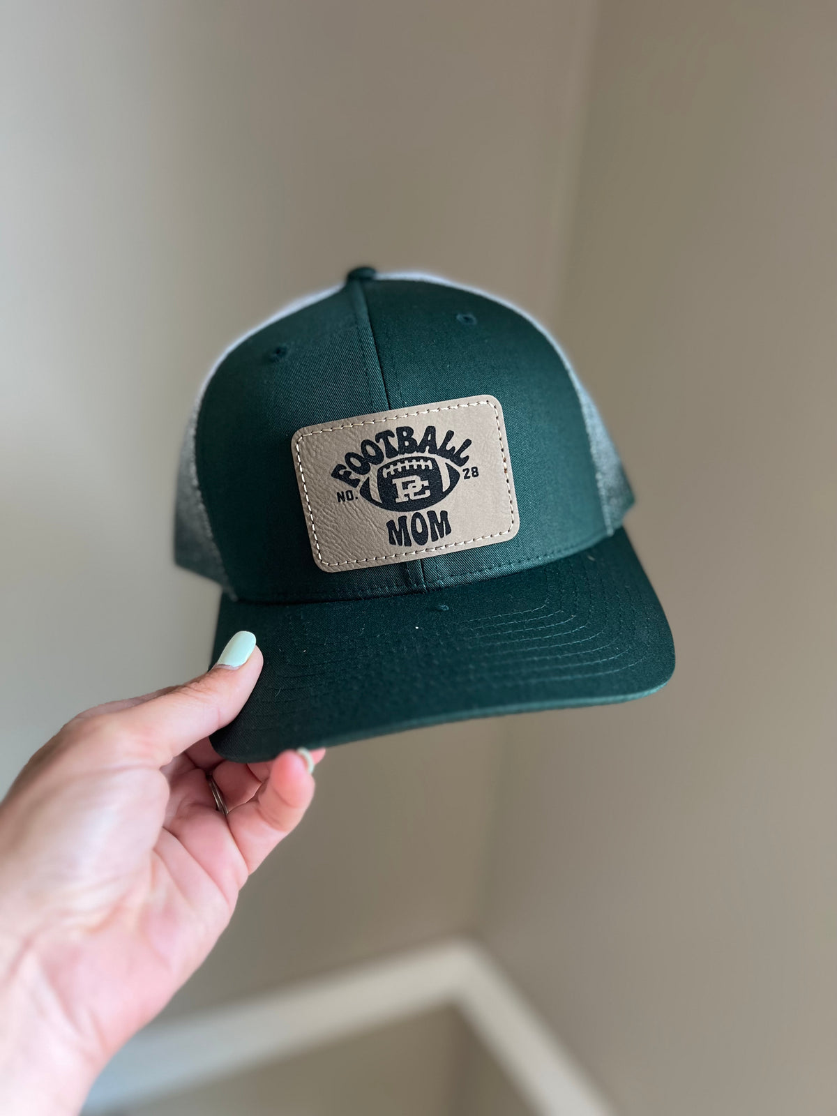 Design your own hat with a custom saying or logo on a leather patch