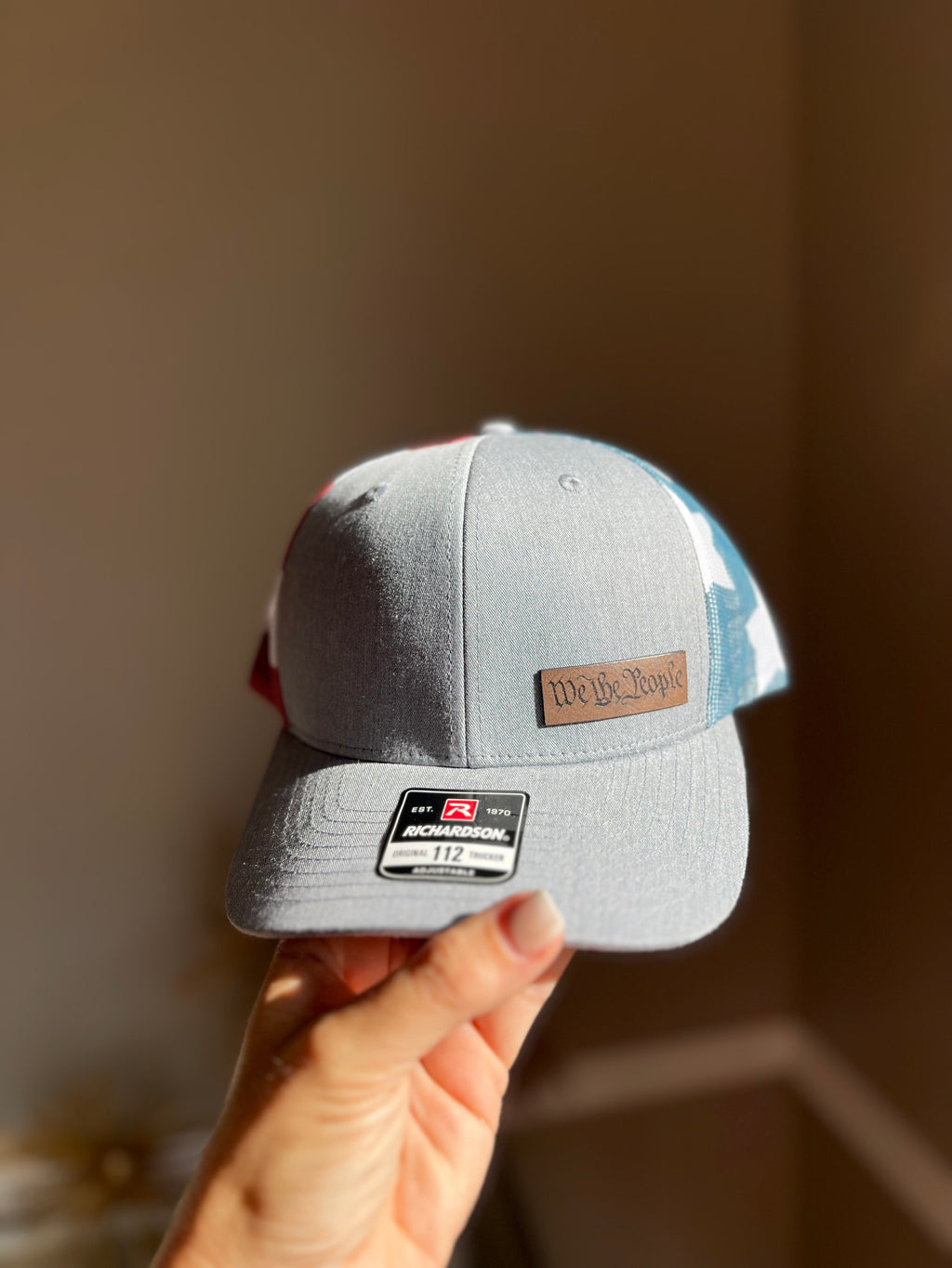 Design your own hat with a custom saying or logo on a leather patch