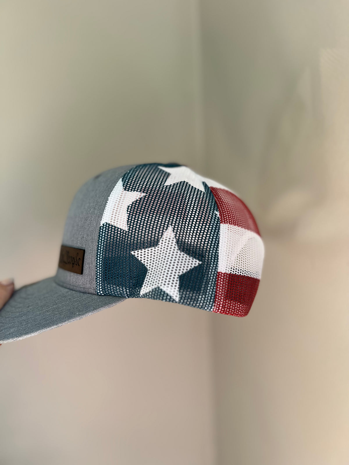 Design your own hat with a custom saying or logo on a leather patch