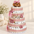 Gold mirror acrylic Baby script cake topper displayed on a blush pink diaper cake
